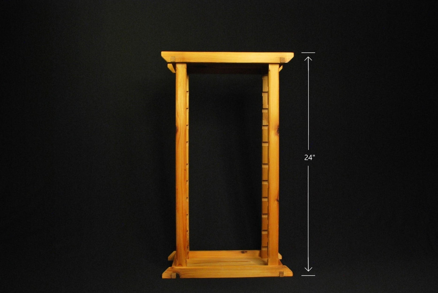 Multi-level cedar plant shelf with tiered design measuring 24" in height